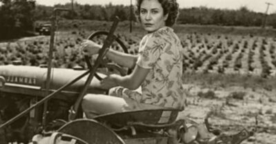 Ей было всего 18, когда на фронт забрали отца и брата. Вся надежда села — на старенький, рычащий трактор, который отказывался заводиться. Но она не просто завела его… Она выпахала на нём Победу
